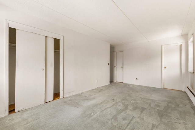 interior space featuring light colored carpet