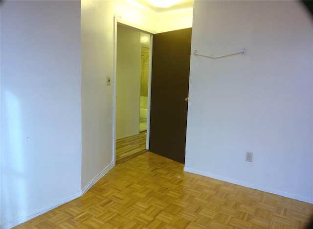 hallway with light parquet flooring