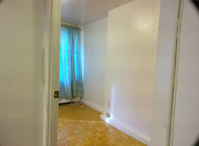 bathroom featuring parquet flooring