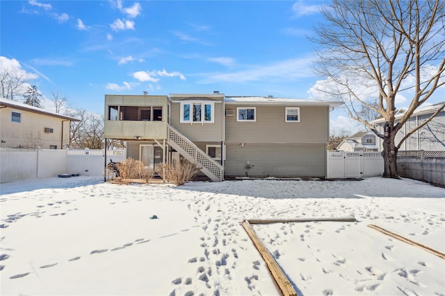 view of snow covered house