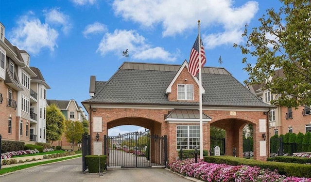 319 Trotting Ln Unit 23, Westbury, NY 11590 - view of community featuring a gate