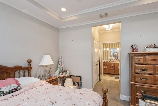 319 Trotting Ln Unit 23, Westbury, NY 11590 - bedroom with light colored carpet, ensuite bathroom, and ornamental molding