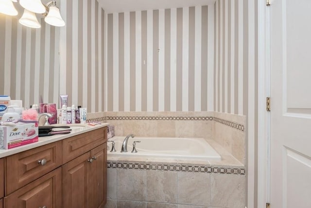 319 Trotting Ln Unit 23, Westbury, NY 11590 - full bathroom with vanity, a bath, and wallpapered walls