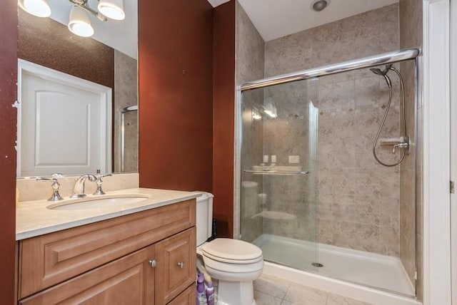 319 Trotting Ln Unit 23, Westbury, NY 11590 - bathroom featuring a stall shower, vanity, and tile patterned floors