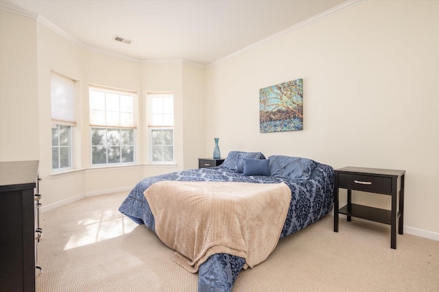 carpeted bedroom with ornamental molding