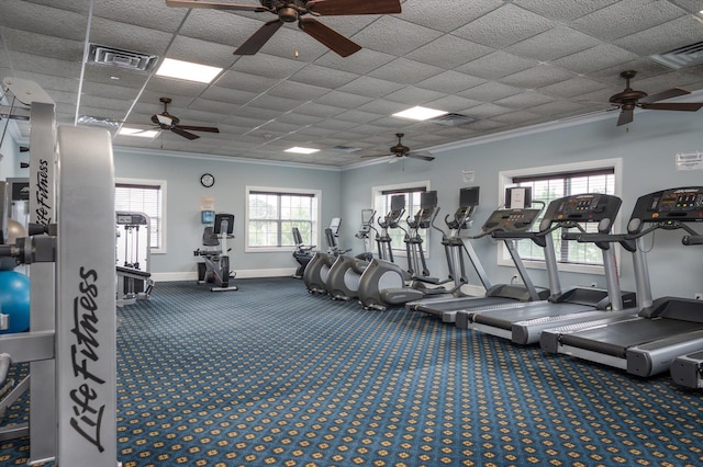 exercise room featuring ornamental molding