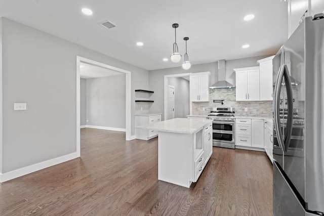 kitchen featuring visible vents, wall chimney exhaust hood, appliances with stainless steel finishes, dark wood-type flooring, and open shelves