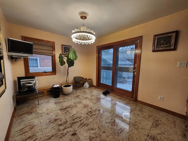 dining room featuring a chandelier