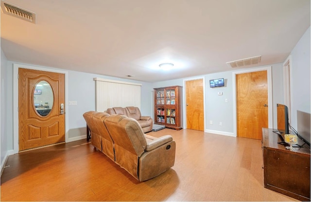 living room with hardwood / wood-style floors