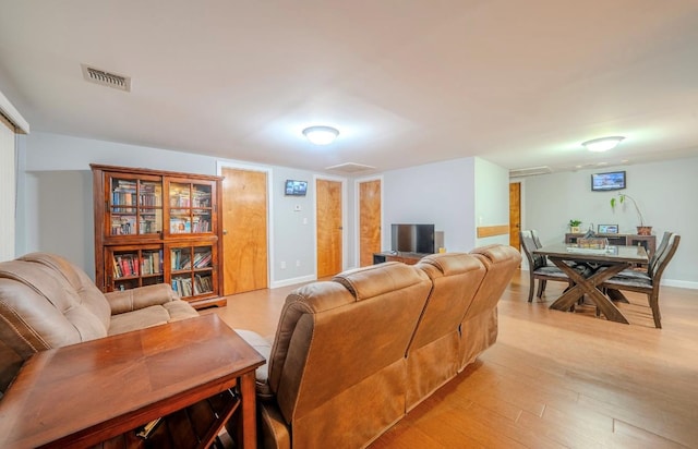 living room featuring light hardwood / wood-style floors