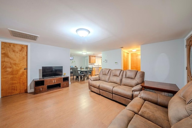 living room with light wood-type flooring