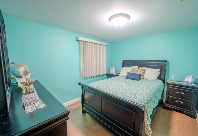 bedroom with light wood-type flooring