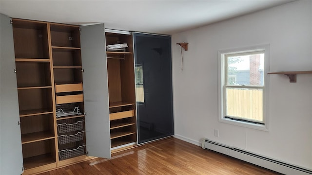 closet featuring a baseboard radiator