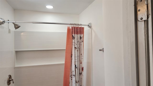 bathroom with curtained shower