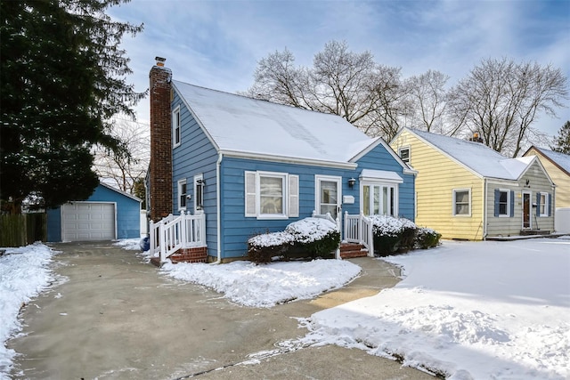 view of front of home with an outbuilding and a garage