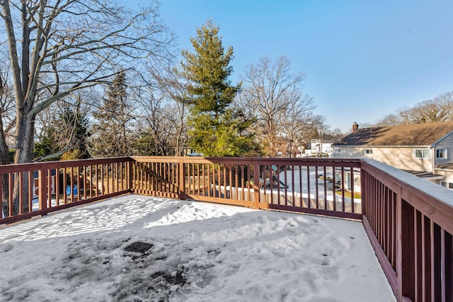 view of snow covered deck