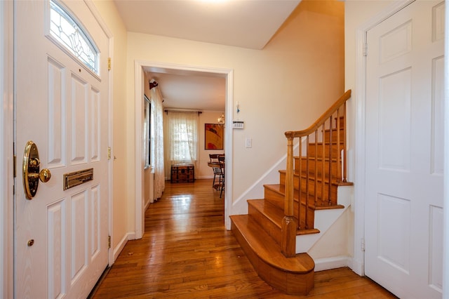 entryway with wood-type flooring