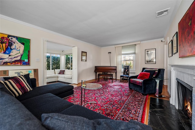 living room featuring crown molding