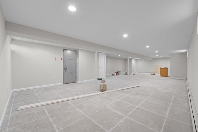 basement featuring a baseboard radiator