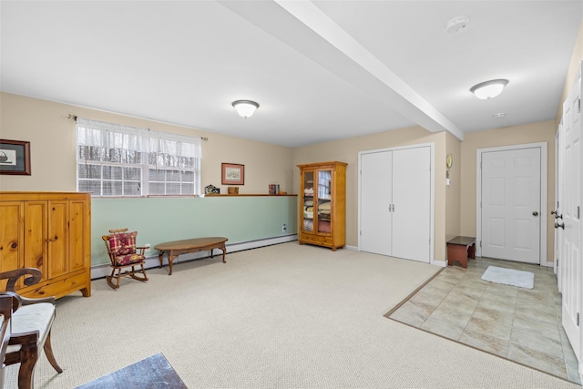 living area featuring light carpet and beamed ceiling