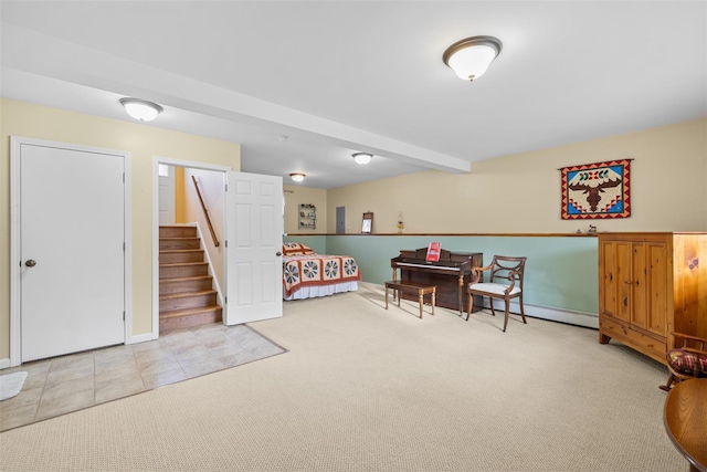 rec room featuring beamed ceiling, a baseboard radiator, and carpet flooring