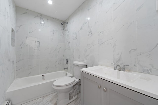 full bathroom with toilet, bathing tub / shower combination, tile walls, and vanity