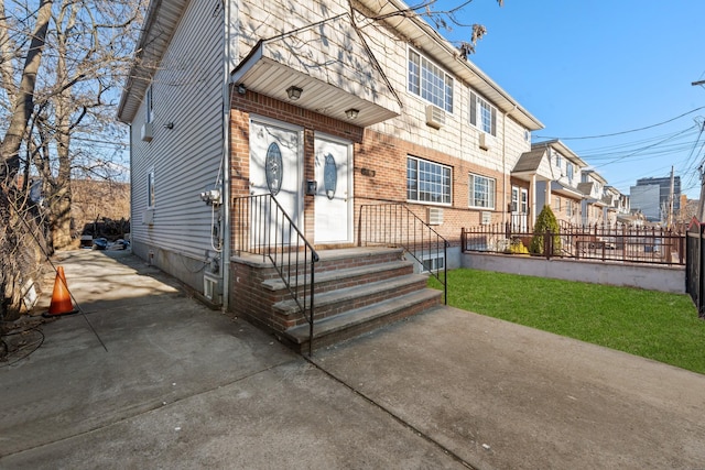 view of front of house with a patio area