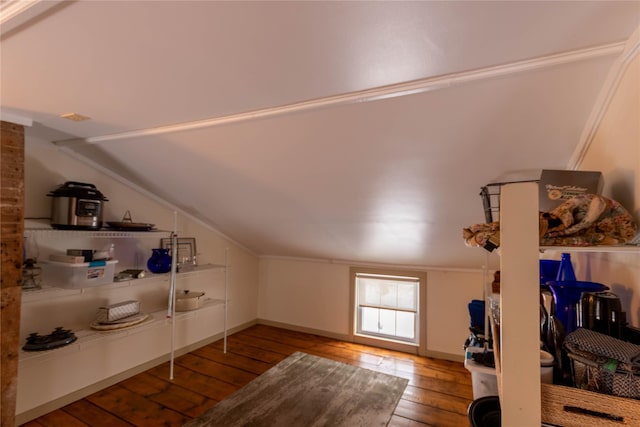 bonus room with lofted ceiling and hardwood / wood-style floors