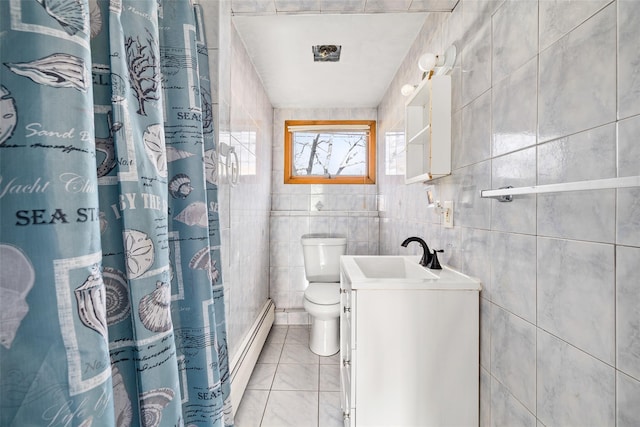 bathroom with baseboard heating, curtained shower, vanity, tile walls, and toilet