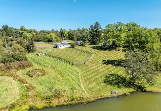 aerial view featuring a rural view and a water view