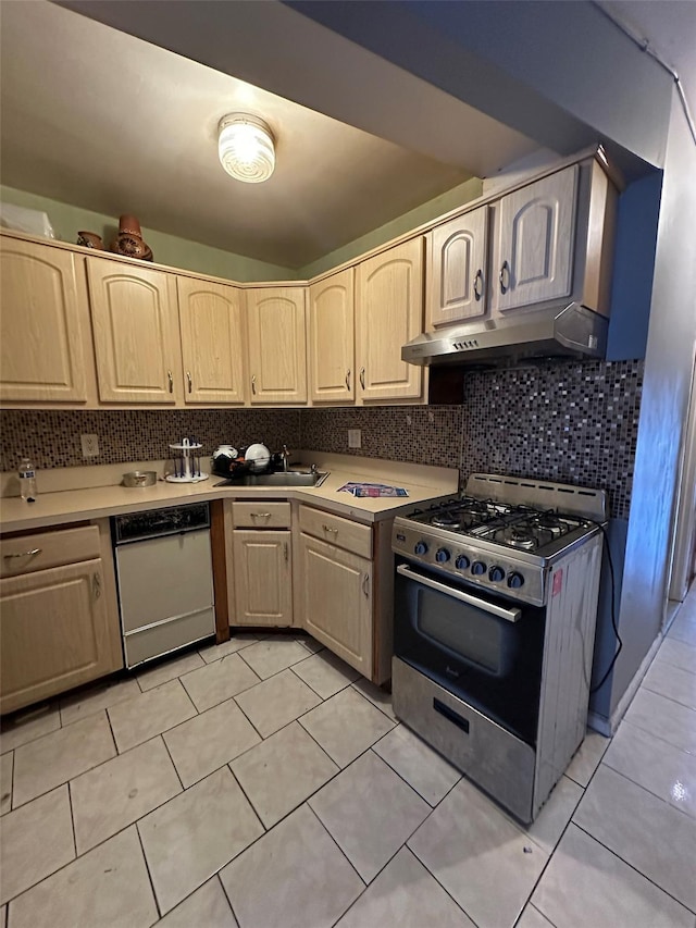 kitchen with dishwasher, decorative backsplash, light tile patterned floors, light brown cabinetry, and gas range