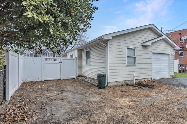 view of home's exterior featuring a garage