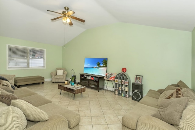 tiled living room with ceiling fan and lofted ceiling