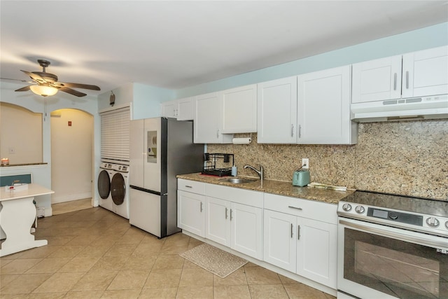 kitchen with sink, white cabinetry, stainless steel appliances, and tasteful backsplash