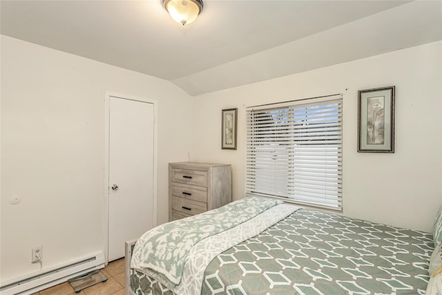 tiled bedroom featuring vaulted ceiling and a baseboard radiator