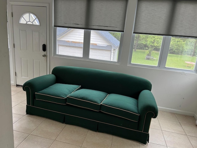 6 Felix Ct, Baldwin, NY 11510 - living room with baseboards and tile patterned flooring