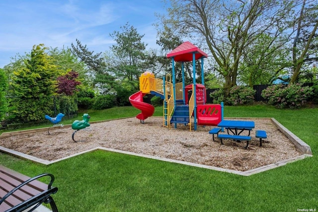 view of jungle gym featuring a yard