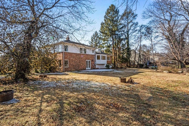 view of yard featuring a sunroom