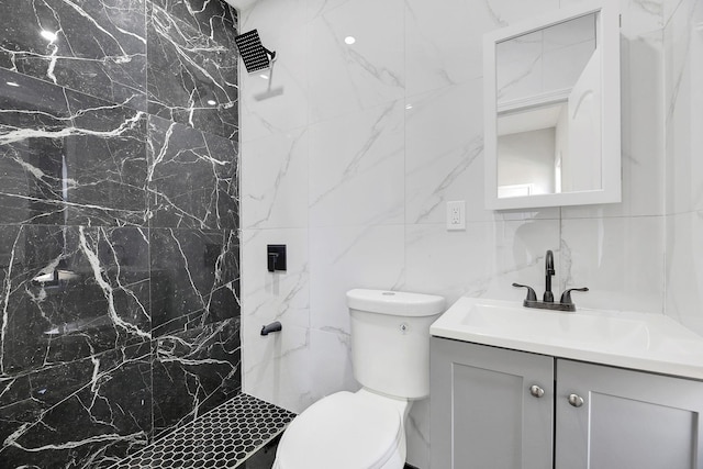 bathroom with toilet, a shower, backsplash, tile walls, and vanity