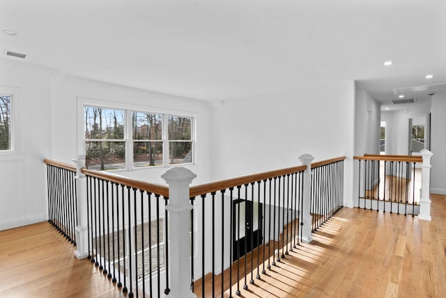 corridor featuring light hardwood / wood-style flooring