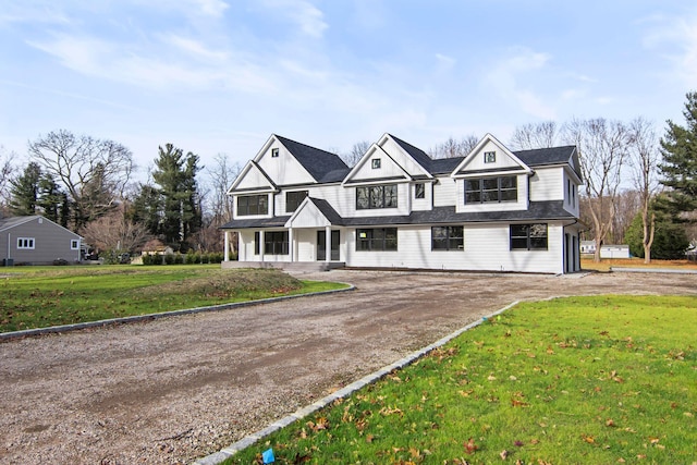 view of front of home featuring a front lawn