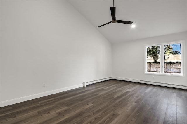 spare room with vaulted ceiling, dark hardwood / wood-style floors, and ceiling fan