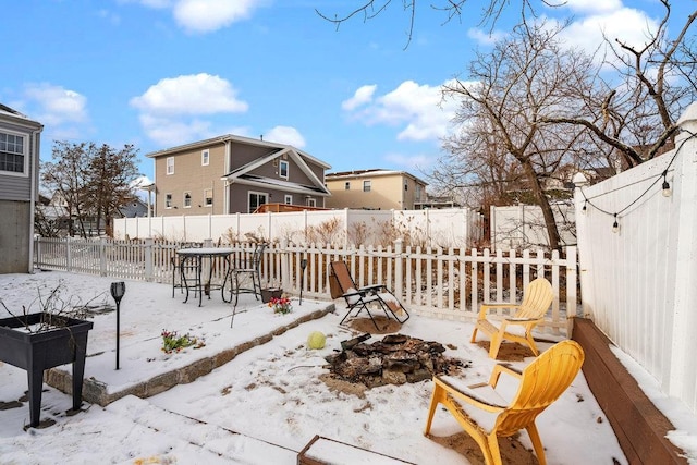 view of snow covered patio