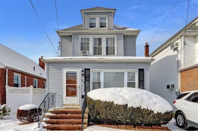 front of property featuring cooling unit