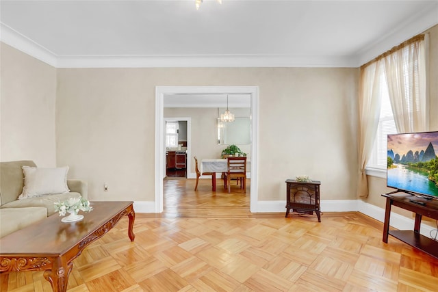 living room with crown molding and parquet flooring