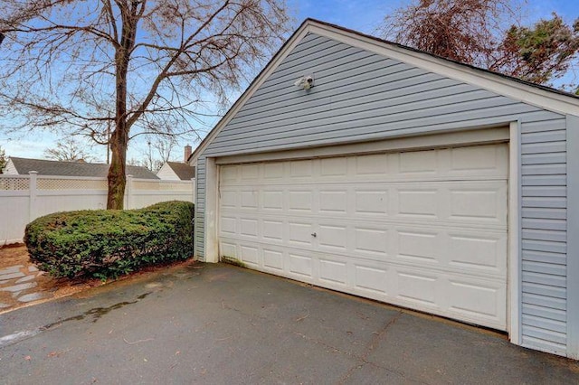 detached garage with fence