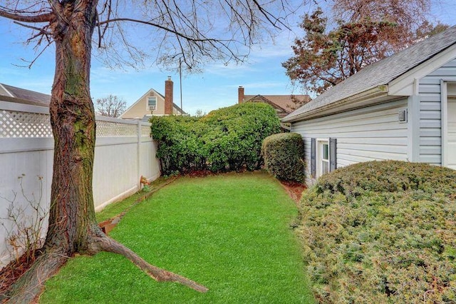 view of yard with fence