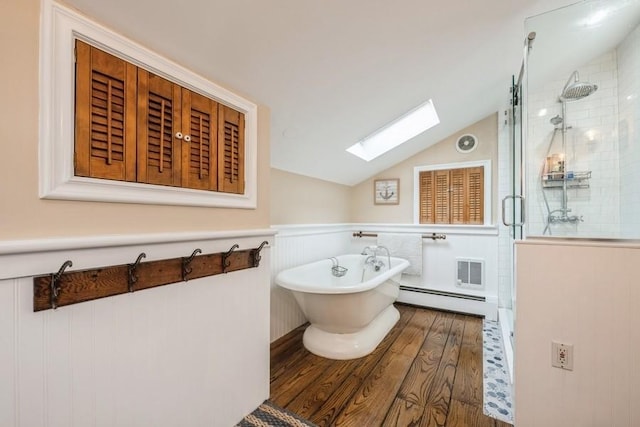 bathroom featuring a baseboard radiator, wood-type flooring, lofted ceiling with skylight, and separate shower and tub