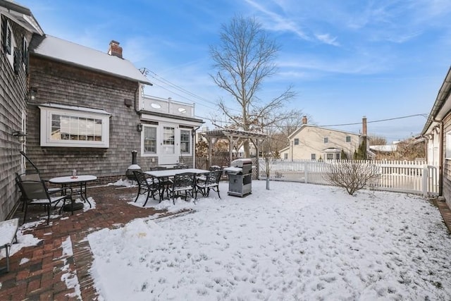 view of yard layered in snow