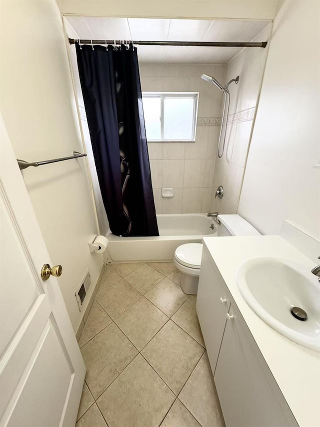 full bathroom with shower / bathtub combination with curtain, vanity, tile patterned floors, and toilet